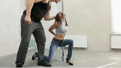 The villian attacks Agent Glenda to her belly The villian attacks Agent Glenda to her belly